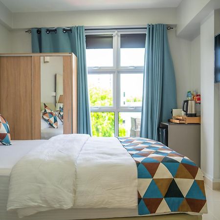 Tour Inn Male Bagian luar foto