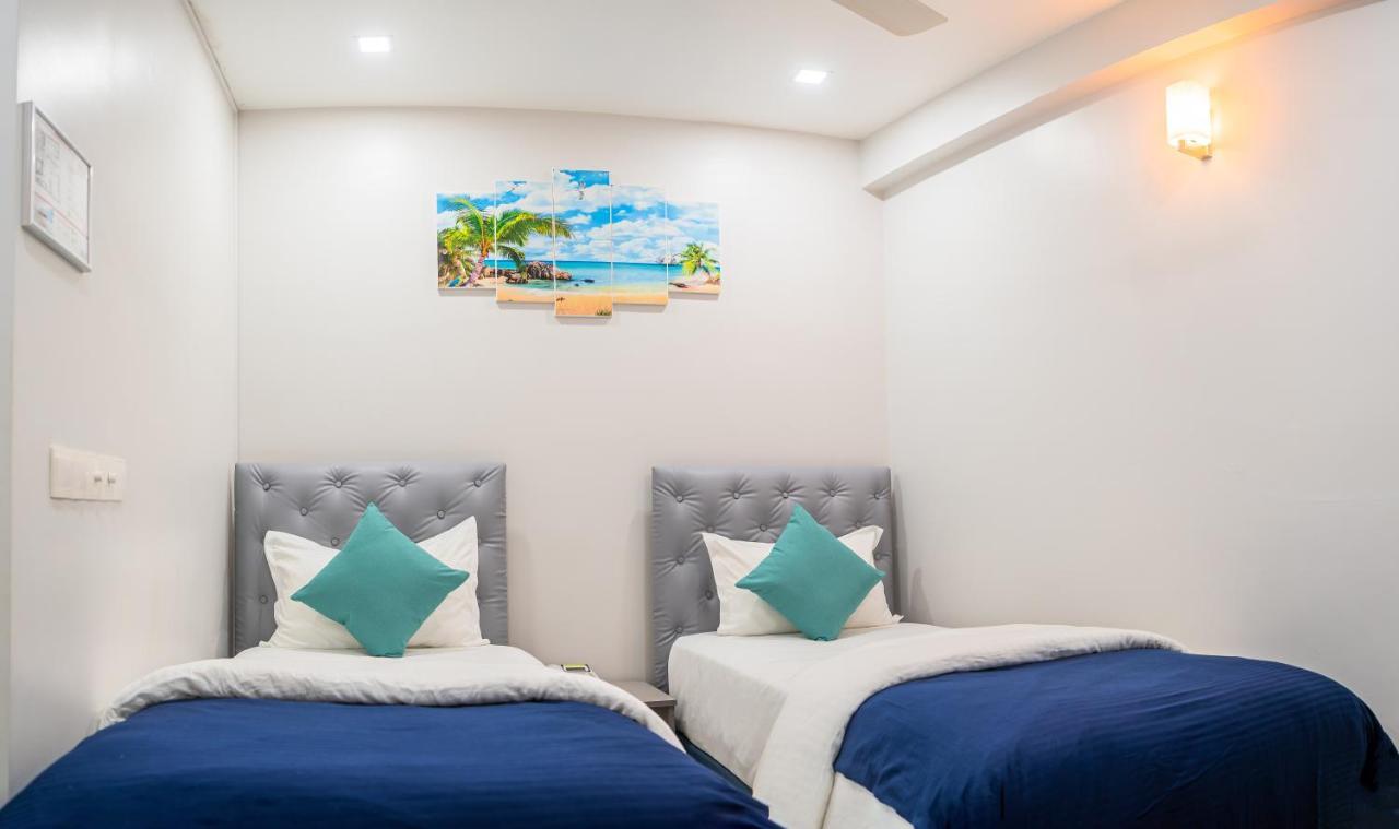 Tour Inn Male Bagian luar foto