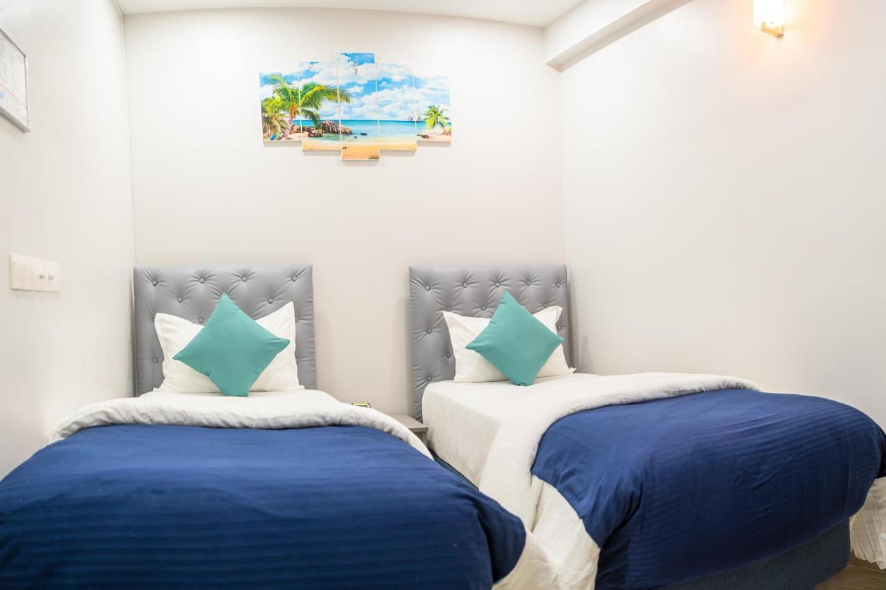 Tour Inn Male Bagian luar foto