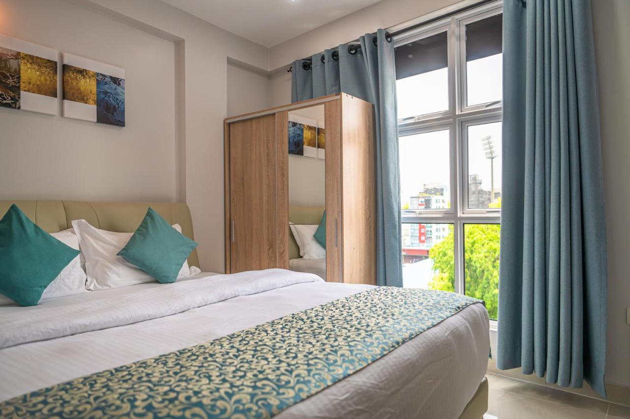 Tour Inn Male Bagian luar foto